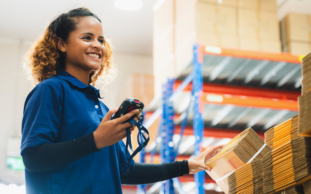 Warehouse associate scanning stock